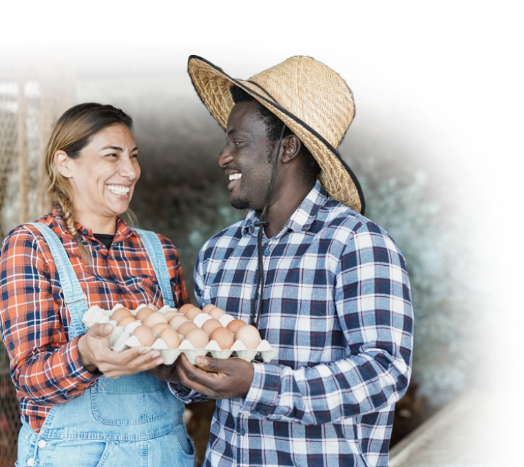 man and woman holding eggs